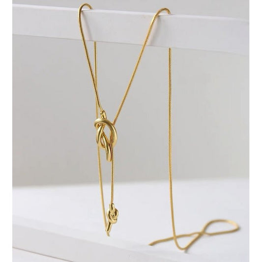 Lange trui ketting met knoop-goud en zilver
